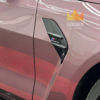 BMW M4 Competition side detail with M4 badge