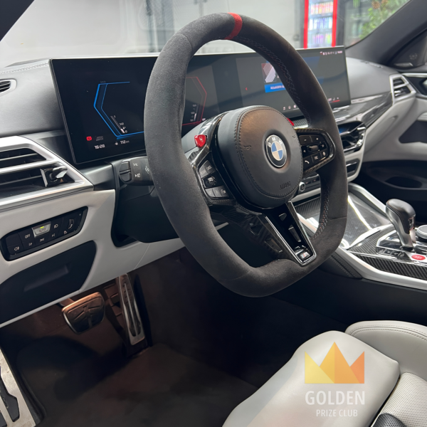 BMW M4 Competition steering wheel and cockpit